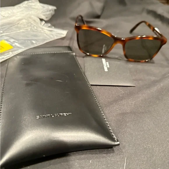 Saint Laurent Tortoiseshell Sunglasses with leather case Yves Saint Laurent | Accessories | Yves Saint Laurent  main image 3